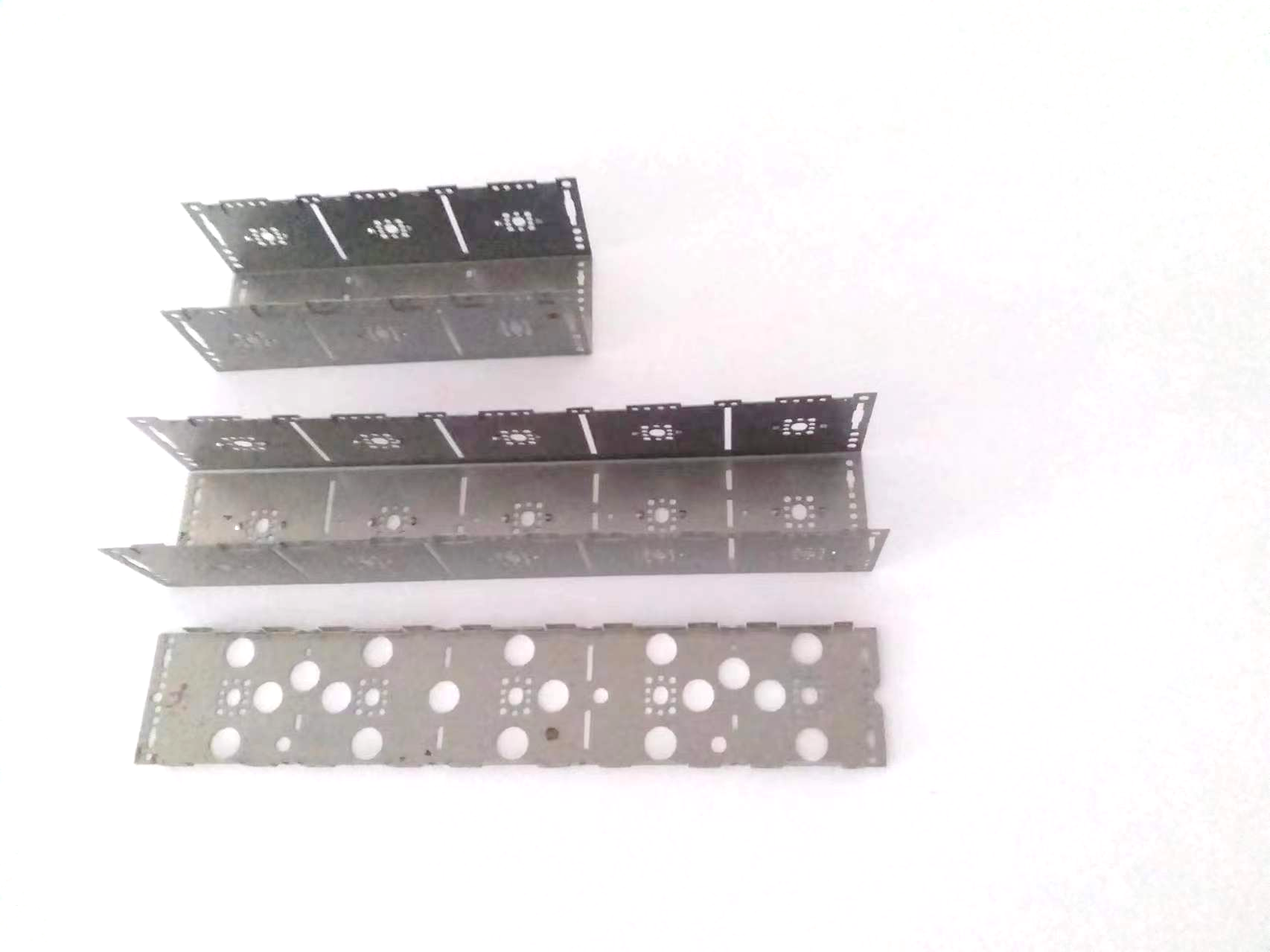 Telecom stamped metal brackets